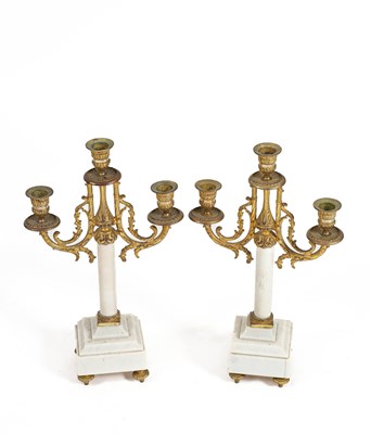 Lot 273 - A pair of white marble and gilt metal mounted three branch candelabra