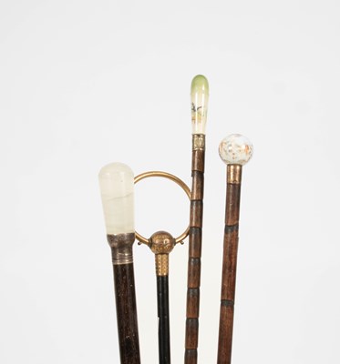 Lot 274 - Four early 20th Century walking canes