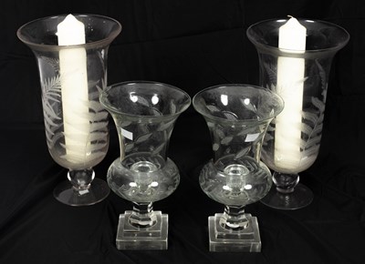 Lot 283 - A pair of clear glass storm lanterns