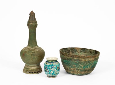 Lot 559 - An Asian or Middle Eastern bronze vase and cover