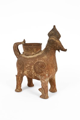 Lot 560 - A South East Asian pottery ewer