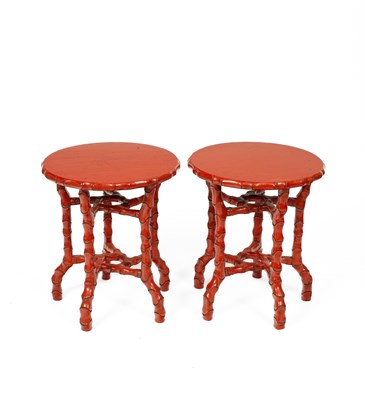 Lot 608 - A pair of coral red painted occasional tables