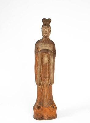 Lot 563 - A large standing pottery figure of an official