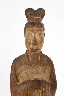 Lot 563 - A large standing pottery figure of an official