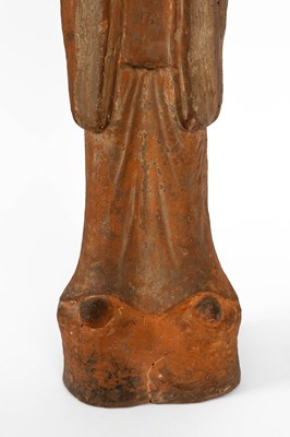 Lot 563 - A large standing pottery figure of an official