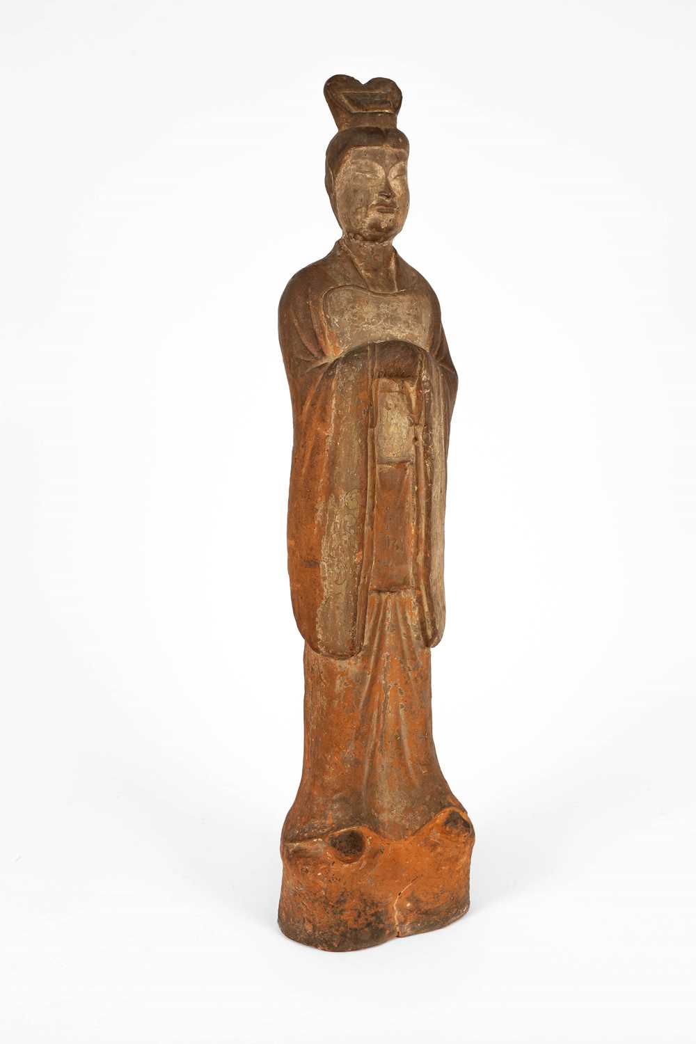 Lot 563 - A large standing pottery figure of an official