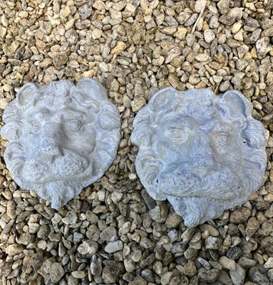 Lot 42 - A pair of cast lead lion masks