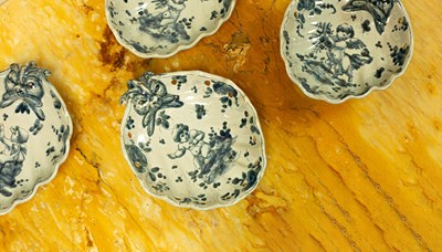 Lot 737 - Four Italian Maiolica shell-shaped dishes