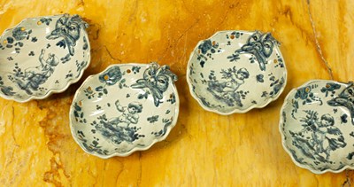 Lot 737 - Four Italian Maiolica shell-shaped dishes