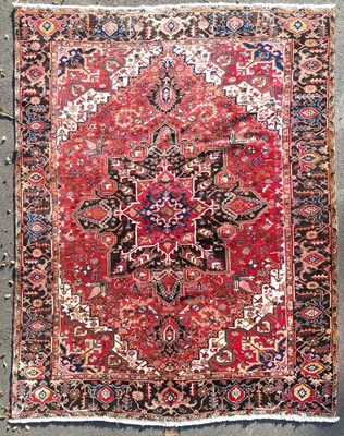 Lot 637 - A Heriz carpet, North West Persia