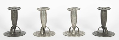 Lot 578 - Archibald Knox for Liberty & Co. four pewter candlesticks