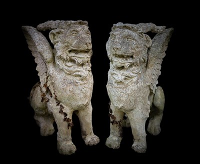 Lot 322 - A pair of reconstituted stone griffins