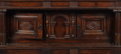 Lot 23 - A Charles I oak livery cupboard