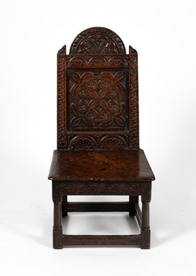 Lot 3 - A James I carved oak low chair