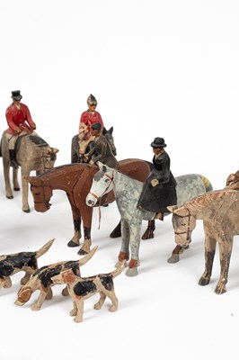 Lot 57 - A carved and painted group of fox hunting figures