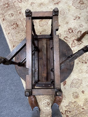 Lot 24 - A small George I oak gateleg table