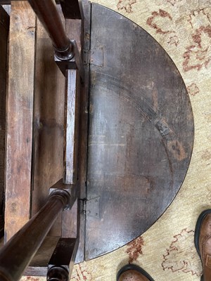 Lot 24 - A small George I oak gateleg table