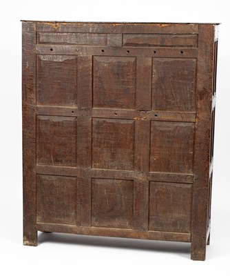 Lot 26 - A Charles II carved oak two door cupboard