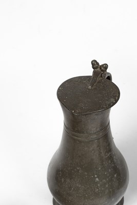 Lot 54 - Two pewter flagons
