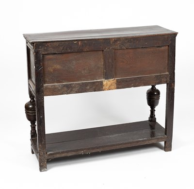 Lot 34 - A James I oak livery cupboard