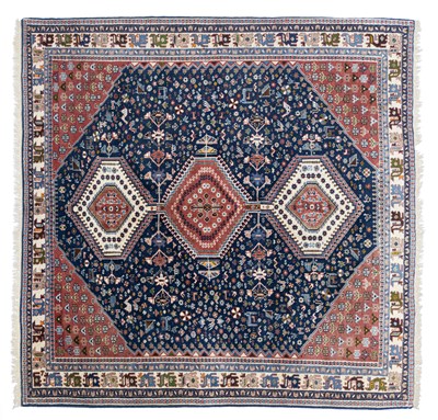 Lot 51 - A near square Shirvan design carpet