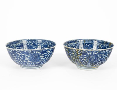 Lot 578 - A pair of Chinese blue and white ‘Lotus’ bowls