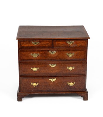 Lot 59 - A George II oak five drawer chest