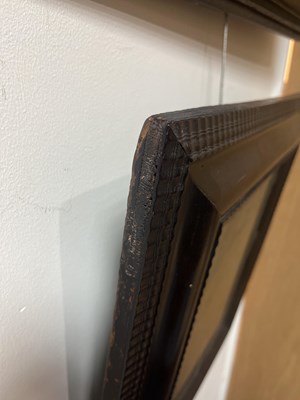 Lot 60 - A Dutch ebonised and ripple moulded mirror