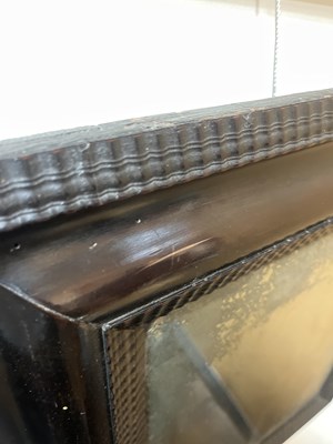 Lot 60 - A Dutch ebonised and ripple moulded mirror