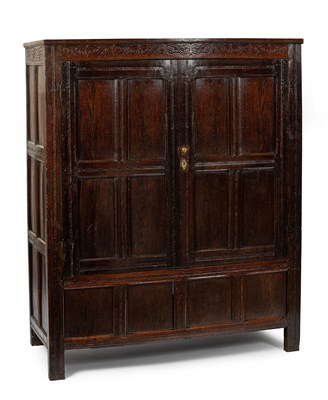 Lot 15 - A Charles II oak two door cupboard