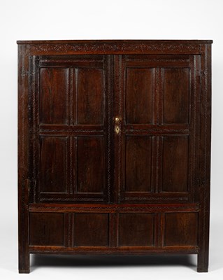 Lot 15 - A Charles II oak two door cupboard