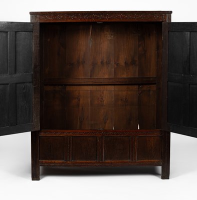 Lot 15 - A Charles II oak two door cupboard