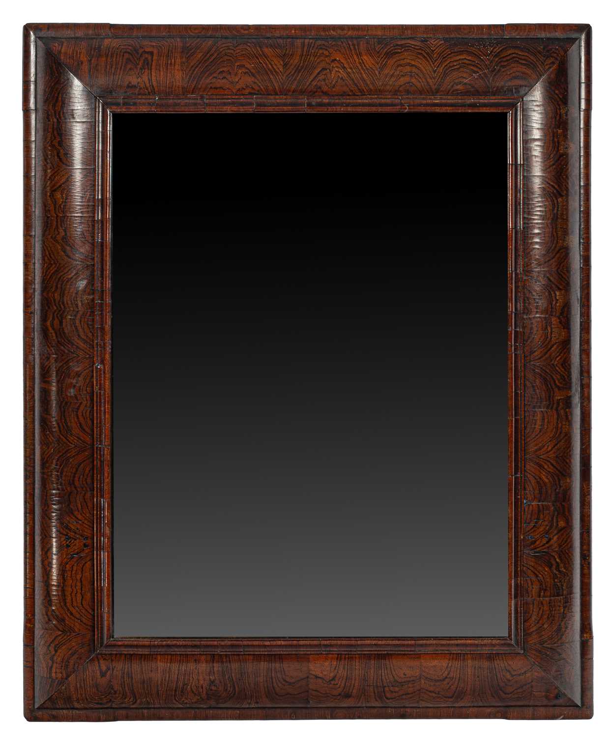 Lot 13 - A large William & Mary figured walnut cushion frame mirror