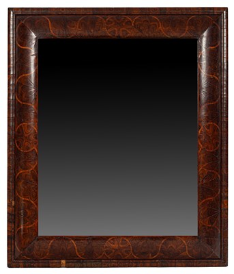 Lot 44 - A large William & Mary style oyster and inlaid cushion frame mirror