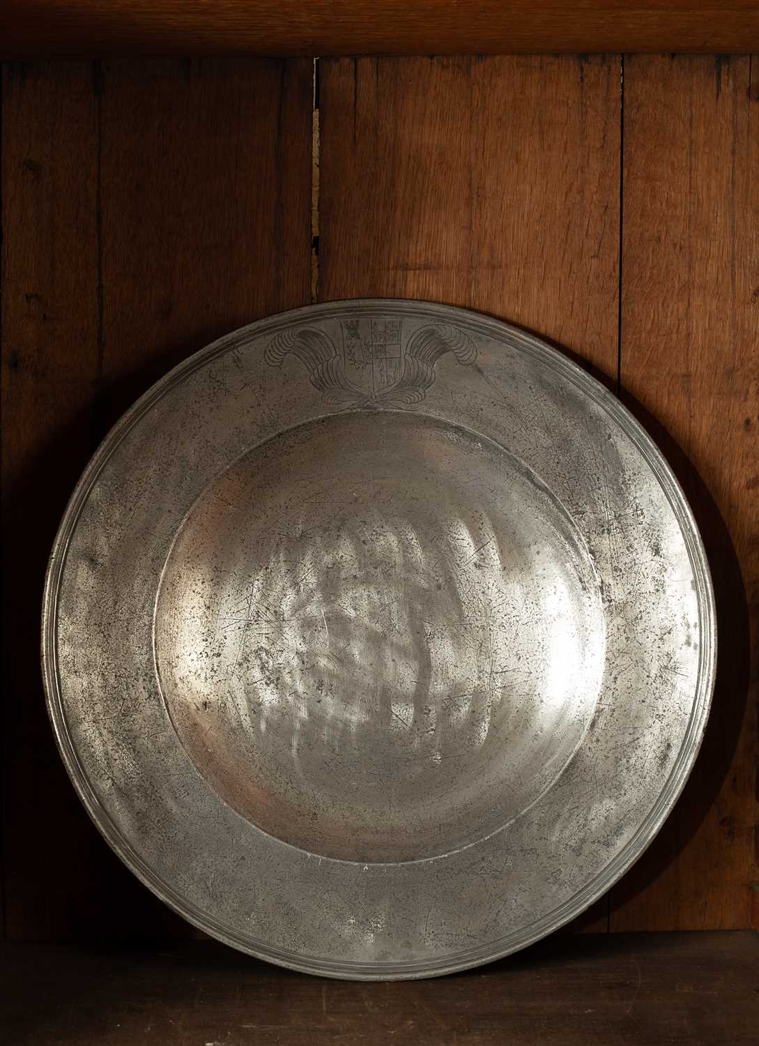 Lot 199 - An English pewter semi broad rim charger