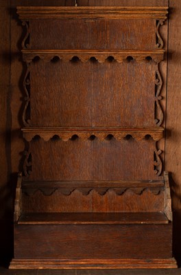 Lot 201 - A George III oak hanging spoon rack