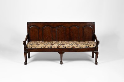 Lot 162 - A George III oak settle