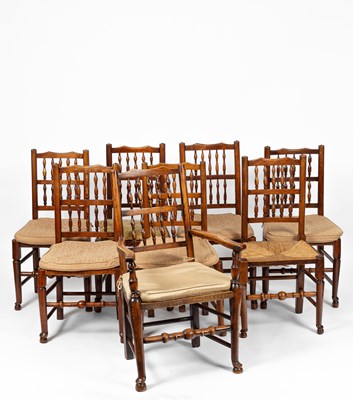 Lot 337 - A closely matched set of eight Victorian spindle back dining chairs