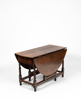 Lot 165 - An 18th Century oak gateleg table