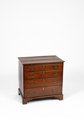 Lot 166 - A George III oak chest of four drawers