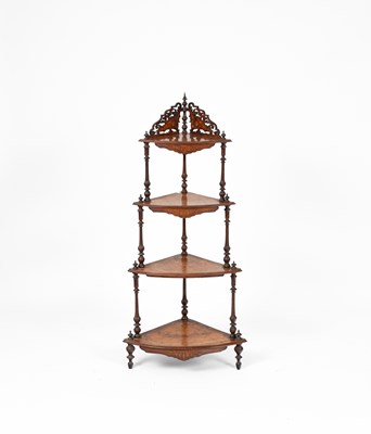 Lot 344 - A Victorian walnut inlaid whatnot