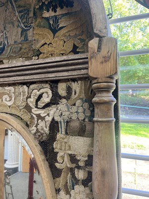 Lot 191 - A patchwork tapestry panelled alcove mirror