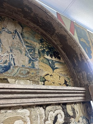 Lot 191 - A patchwork tapestry panelled alcove mirror