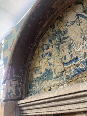 Lot 191 - A patchwork tapestry panelled alcove mirror