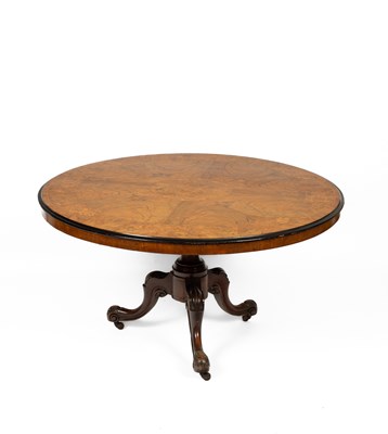 Lot 346 - A Victorian walnut and marquetry inlaid circular breakfast table