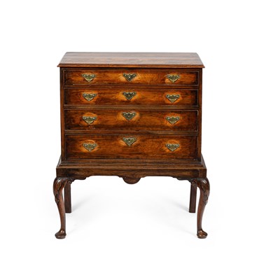 Lot 130 - A George I walnut and elm veneered chest on stand