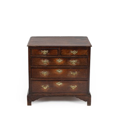 Lot 131 - A George II oak chest