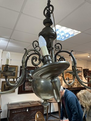 Lot 47 - A Dutch brass six-branch chandelier