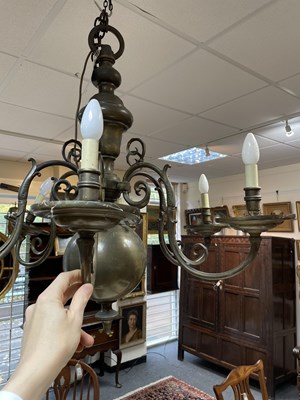 Lot 47 - A Dutch brass six-branch chandelier