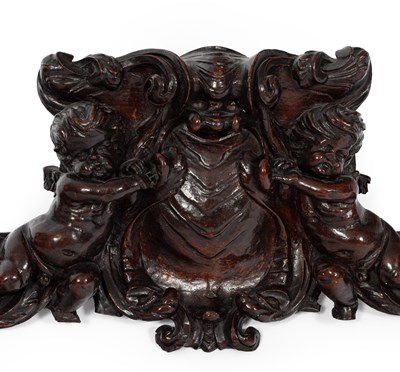 Lot 66 - An 18th century French carved walnut cresting